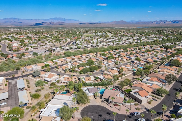 bird's eye view with a mountain view