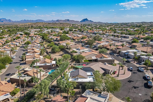 drone / aerial view featuring a mountain view