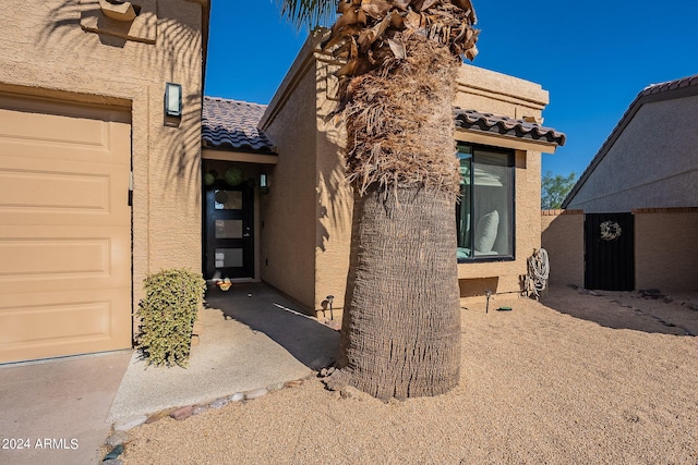 property entrance featuring a garage