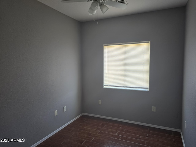 empty room featuring ceiling fan