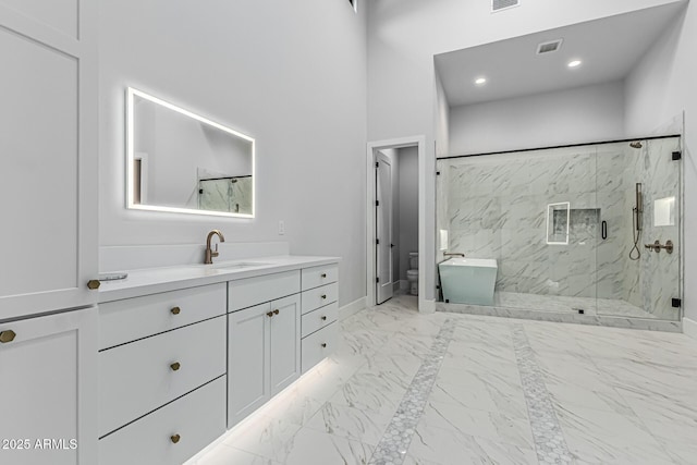 3653 E Runaway Bay Pl, Queen Creek, AZ 85142 - full bathroom with vanity, marble finish floors, a marble finish shower, toilet, and baseboards
