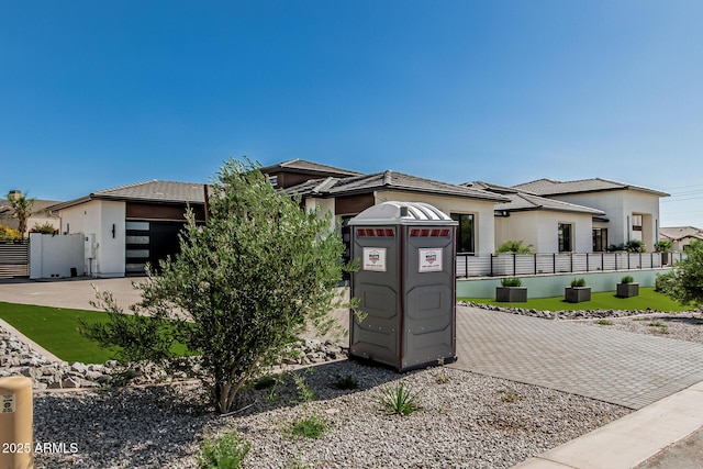3653 E Runaway Bay Pl, Queen Creek, AZ 85142 - view of front of house featuring an attached garage and stucco siding