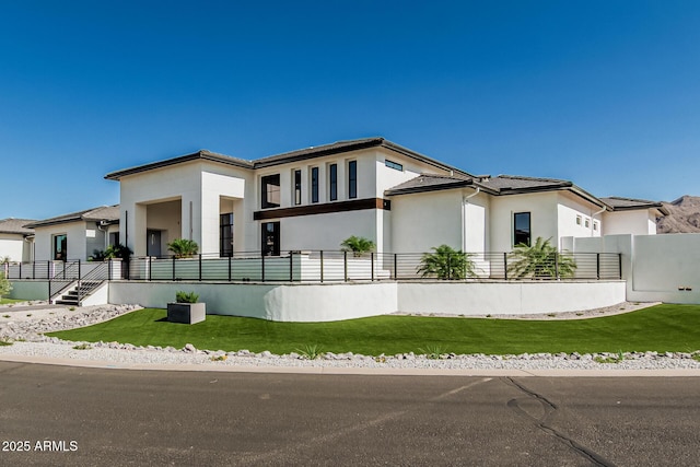3653 E Runaway Bay Pl, Queen Creek, AZ 85142 - view of front of house with stucco siding and a front yard