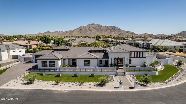 3653 E Runaway Bay Pl, Queen Creek, AZ 85142 - view of front facade featuring a residential view, a mountain view, a tile roof, and stucco siding