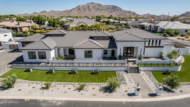 3653 E Runaway Bay Pl, Queen Creek, AZ 85142 - view of front of home with a residential view, french doors, a mountain view, and a tile roof