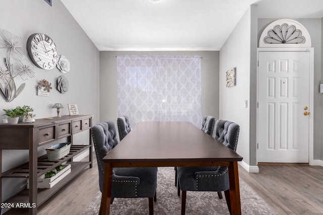 dining area with light wood-type flooring