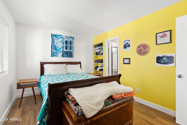 bedroom featuring hardwood / wood-style floors