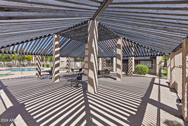 view of patio with a community pool