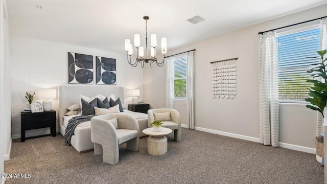 carpeted bedroom featuring baseboards, a notable chandelier, multiple windows, and visible vents