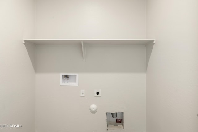 laundry room with laundry area, hookup for a washing machine, gas dryer hookup, and electric dryer hookup
