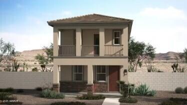 view of front of home with a balcony