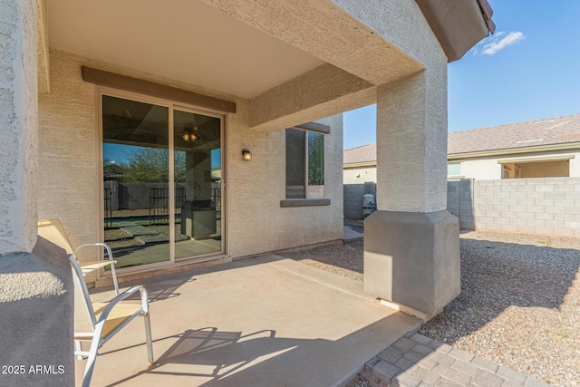 view of patio with fence