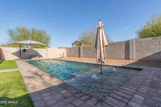 view of pool featuring a fenced backyard