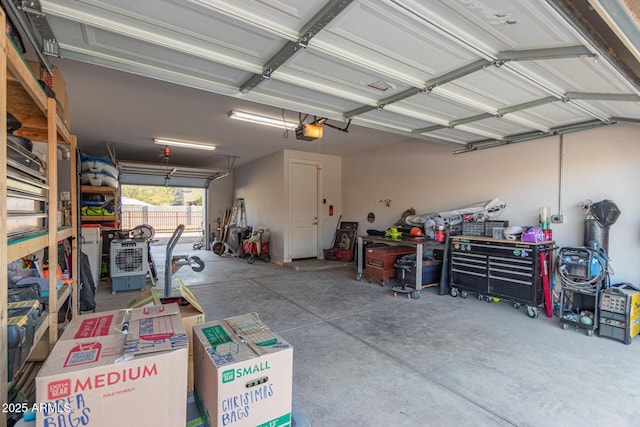 garage featuring a garage door opener