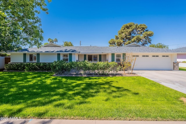 ranch-style home featuring driveway, a front yard, a garage, and roof with shingles