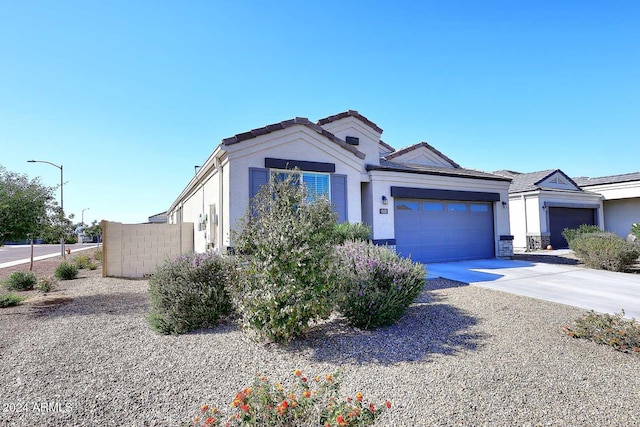 view of front of home with a garage