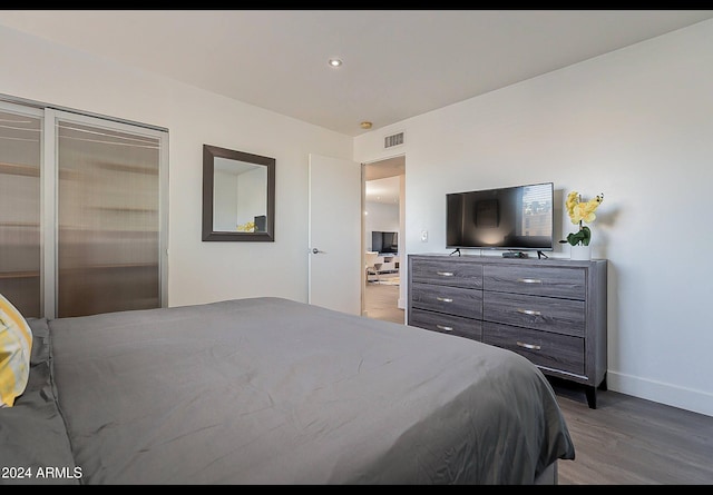 bedroom featuring hardwood / wood-style flooring