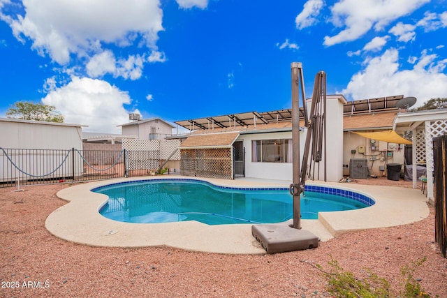 view of pool featuring cooling unit, a patio, a fenced in pool, and a fenced backyard