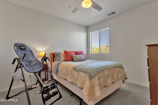 carpeted bedroom featuring ceiling fan