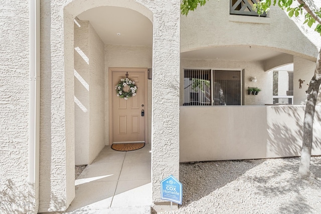 9550 E Thunderbird Rd Unit 152, Scottsdale, AZ 85260 - doorway to property featuring stucco siding