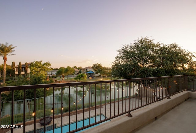 921 E Canyon Way, Chandler, AZ 85249 - balcony at dusk with view of pool area