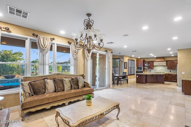 921 E Canyon Way, Chandler, AZ 85249 - living area with a chandelier, recessed lighting, healthy amount of natural light, and baseboards