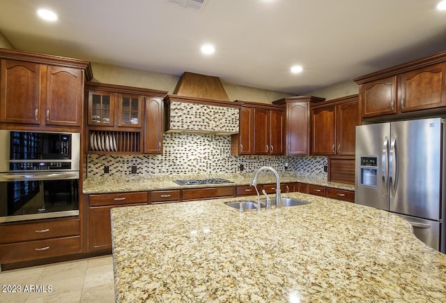 921 E Canyon Way, Chandler, AZ 85249 - kitchen featuring appliances with stainless steel finishes, a sink, premium range hood, decorative backsplash, and recessed lighting