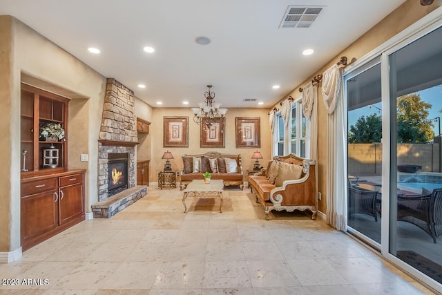 921 E Canyon Way, Chandler, AZ 85249 - living area with recessed lighting, a fireplace, a chandelier, and baseboards