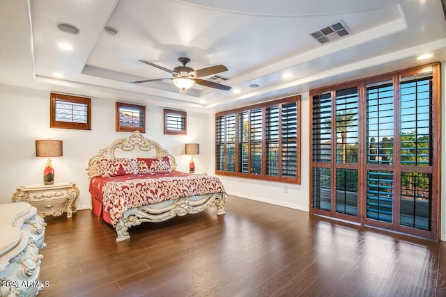 921 E Canyon Way, Chandler, AZ 85249 - bedroom featuring a tray ceiling, baseboards, access to exterior, wood finished floors, and recessed lighting