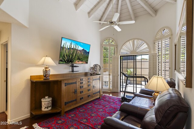 7955 E Chaparral Rd Unit 129, Scottsdale, AZ 85250 - living area featuring wood finished floors, high vaulted ceiling, a ceiling fan, and a wooden ceiling with exposed beams