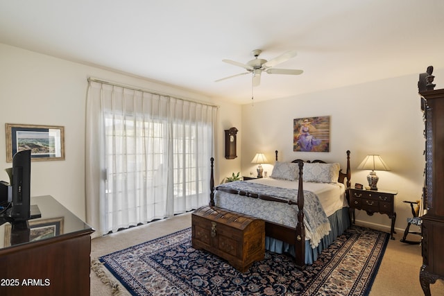 7955 E Chaparral Rd Unit 129, Scottsdale, AZ 85250 - bedroom with carpet flooring and a ceiling fan