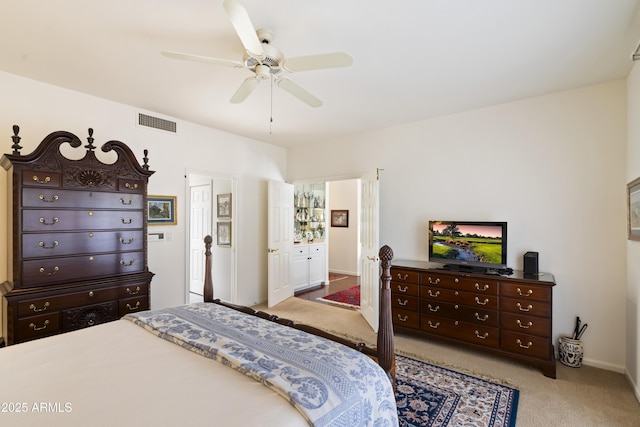 7955 E Chaparral Rd Unit 129, Scottsdale, AZ 85250 - carpeted bedroom featuring baseboards and a ceiling fan