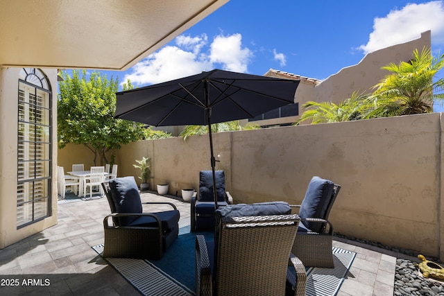 7955 E Chaparral Rd Unit 129, Scottsdale, AZ 85250 - view of patio featuring outdoor dining space