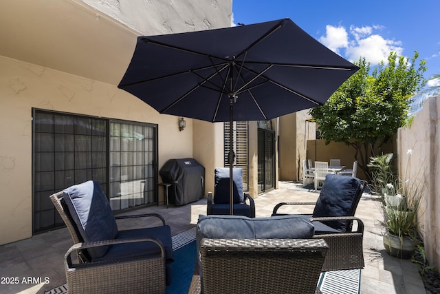 7955 E Chaparral Rd Unit 129, Scottsdale, AZ 85250 - view of patio with a grill, an outdoor hangout area, and outdoor dining area