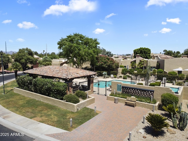 7955 E Chaparral Rd Unit 129, Scottsdale, AZ 85250 - view of home's community with a gazebo and a pool