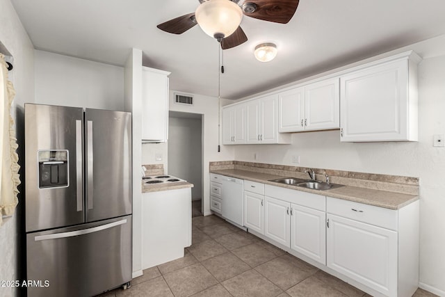 3208 W Port Royale Ln, Phoenix, AZ 85053 - kitchen featuring stainless steel refrigerator with ice dispenser, dishwasher, a ceiling fan, and white cabinets