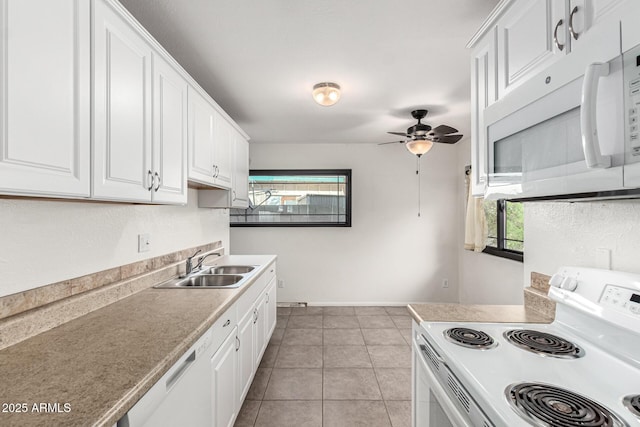 3208 W Port Royale Ln, Phoenix, AZ 85053 - kitchen with white appliances, plenty of natural light, white cabinetry, and ceiling fan