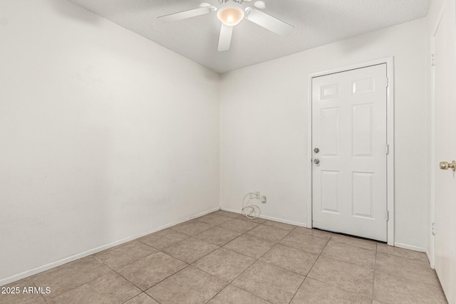 3208 W Port Royale Ln, Phoenix, AZ 85053 - unfurnished room featuring a ceiling fan, light tile patterned floors, and a textured ceiling