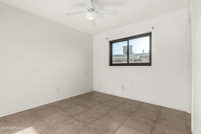 3208 W Port Royale Ln, Phoenix, AZ 85053 - unfurnished room with a ceiling fan and tile patterned floors