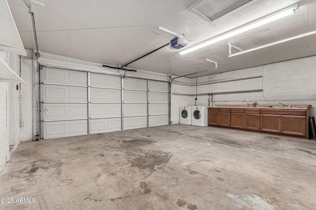 3208 W Port Royale Ln, Phoenix, AZ 85053 - garage with a garage door opener and washing machine and dryer