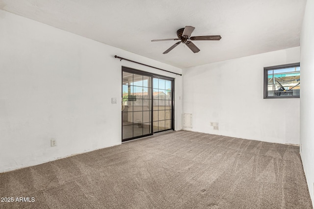 3208 W Port Royale Ln, Phoenix, AZ 85053 - empty room featuring carpet floors, ceiling fan, and plenty of natural light