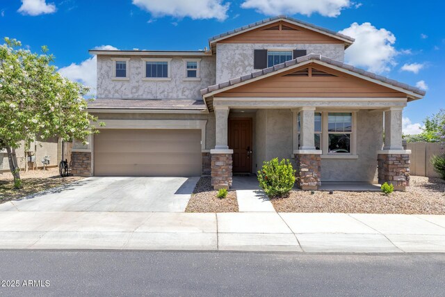 2741 S Gordon, Mesa, AZ 85209 - view of front of property with stone siding, a garage, stucco siding, concrete driveway, and a tiled roof