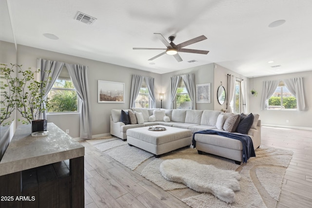 2741 S Gordon, Mesa, AZ 85209 - living room with baseboards, light wood finished floors, and ceiling fan