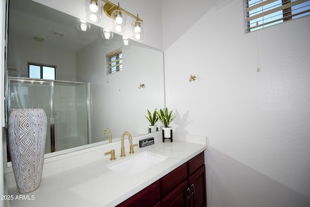 bathroom featuring vanity and walk in shower