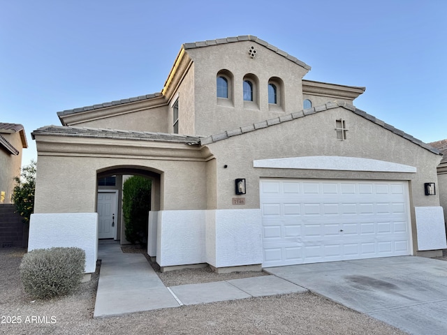 view of front of property with a garage