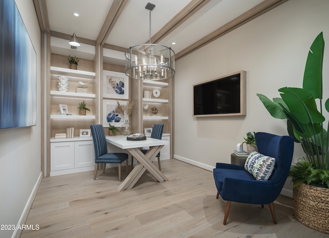 office area featuring light hardwood / wood-style flooring, a chandelier, and beamed ceiling