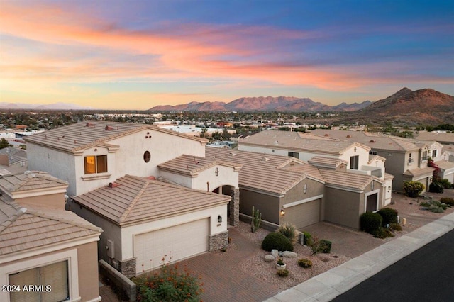 aerial view at dusk with a mountain view