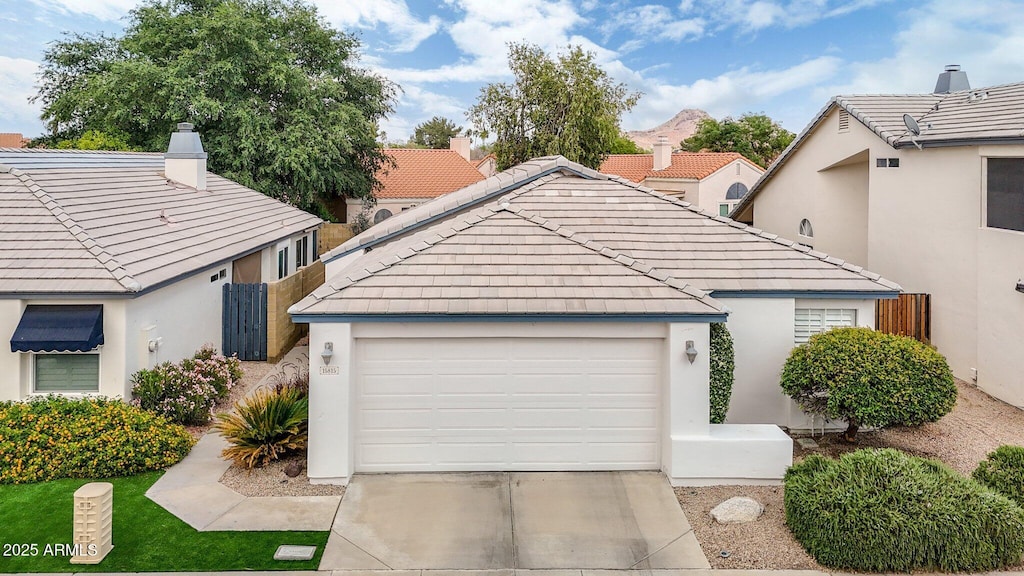 15815 N 4th Dr, Phoenix, AZ 85023 - view of front of property featuring a tiled roof, stucco siding, and concrete driveway