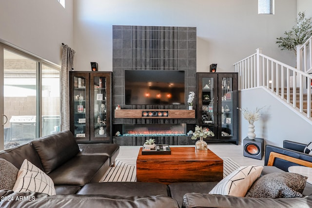 living room with a high ceiling