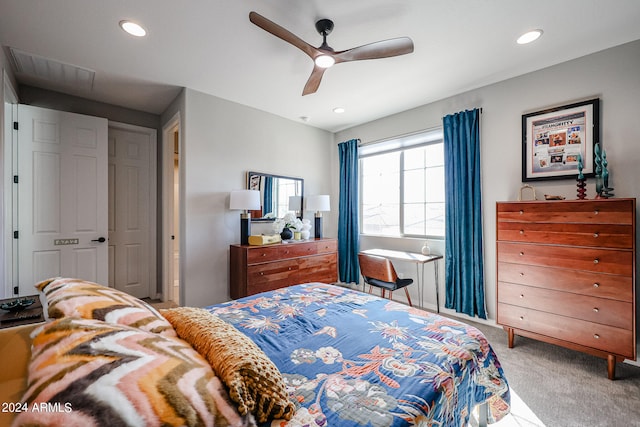 carpeted bedroom with ceiling fan